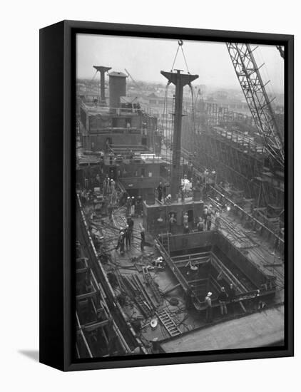 Men Working on the Liberty Ship in the Kaiser Shipyard-Hansel Mieth-Framed Premier Image Canvas