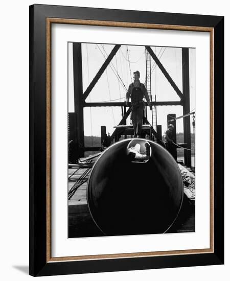 Men Working on the Texas Illinois Natural Gas Company's Pipeline Suspension Bridge-John Dominis-Framed Photographic Print