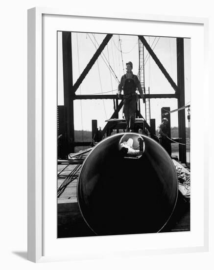 Men Working on the Texas Illinois Natural Gas Company's Pipeline Suspension Bridge-John Dominis-Framed Photographic Print