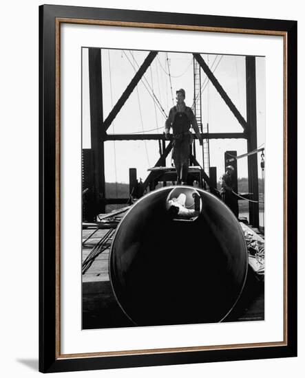 Men Working on the Texas Illinois Natural Gas Company's Pipeline Suspension Bridge-John Dominis-Framed Photographic Print