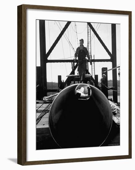 Men Working on the Texas Illinois Natural Gas Company's Pipeline Suspension Bridge-John Dominis-Framed Photographic Print