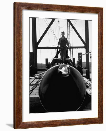 Men Working on the Texas Illinois Natural Gas Company's Pipeline Suspension Bridge-John Dominis-Framed Photographic Print