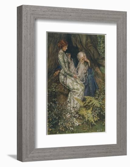 Merlin is Spellbound by His Lover Nimue-Eleanor Fortescue Brickdale-Framed Photographic Print