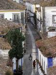 Woman in Narrow Alley with Whitewashed Houses, Obidos, Portugal-Merrill Images-Photographic Print
