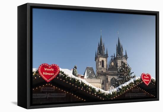 Merry Christmas Sign at Snow-Covered Christmas Market and Tyn Church-Richard Nebesky-Framed Premier Image Canvas