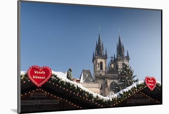 Merry Christmas Sign at Snow-Covered Christmas Market and Tyn Church-Richard Nebesky-Mounted Photographic Print