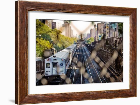 Metro North Train Through Fence-null-Framed Photo