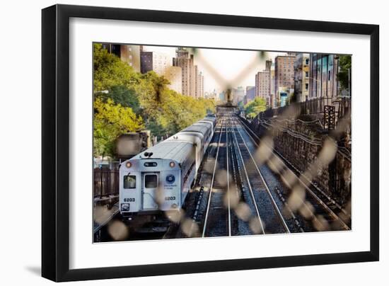 Metro North Train Through Fence-null-Framed Photo