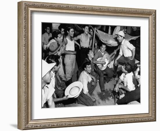 Mexican Farm Workers Singing in their Bunkhouse-null-Framed Premium Photographic Print