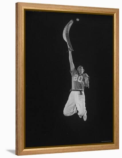 Mexican Jai Alai Player Segundo Jumping to Reach Pelota in Game at Hippodrome-Gjon Mili-Framed Premier Image Canvas