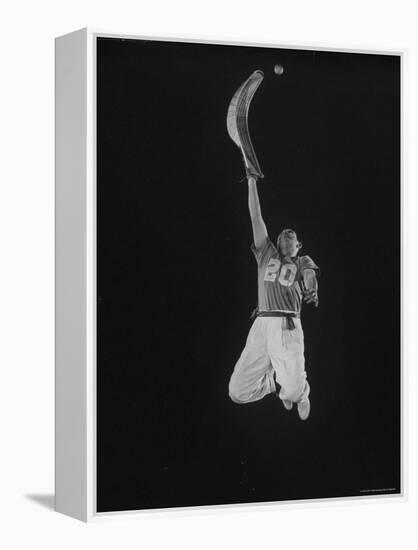 Mexican Jai Alai Player Segundo Jumping to Reach Pelota in Game at Hippodrome-Gjon Mili-Framed Premier Image Canvas