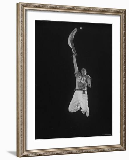 Mexican Jai Alai Player Segundo Jumping to Reach Pelota in Game at Hippodrome-Gjon Mili-Framed Premium Photographic Print