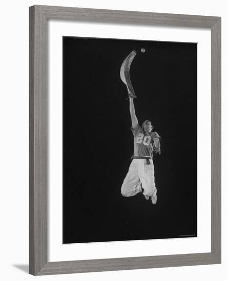 Mexican Jai Alai Player Segundo Jumping to Reach Pelota in Game at Hippodrome-Gjon Mili-Framed Premium Photographic Print