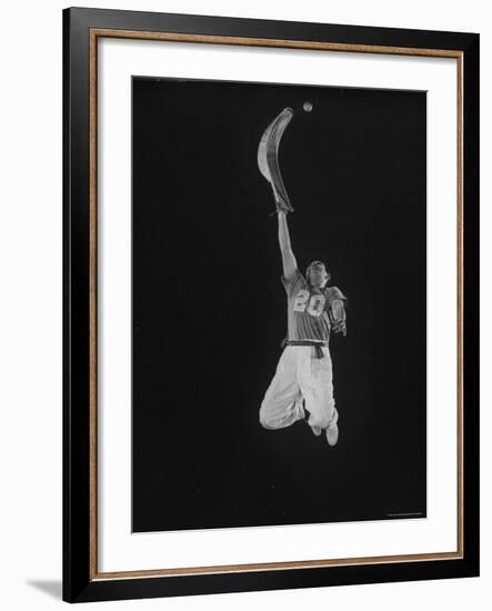 Mexican Jai Alai Player Segundo Jumping to Reach Pelota in Game at Hippodrome-Gjon Mili-Framed Premium Photographic Print