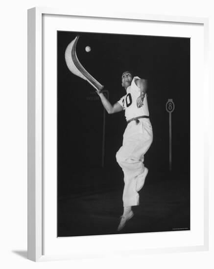 Mexican Jai Alai Player Segundo Jumping to Reach Pelota in Game at Hippodrome-Gjon Mili-Framed Premium Photographic Print