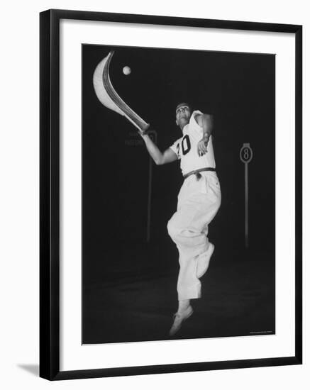 Mexican Jai Alai Player Segundo Jumping to Reach Pelota in Game at Hippodrome-Gjon Mili-Framed Premium Photographic Print