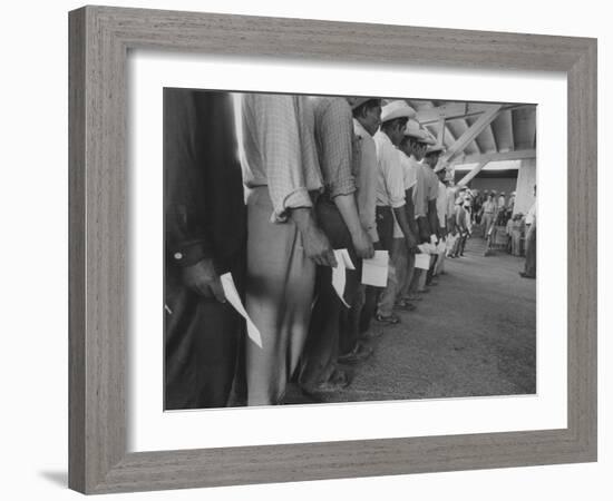 Mexican Migrant Farm Workers Lined Up for Job Interviews and to Sign Contracts at Reception Center-null-Framed Photographic Print