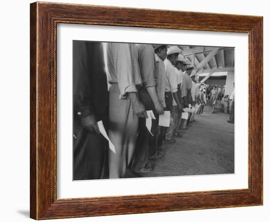 Mexican Migrant Farm Workers Lined Up for Job Interviews and to Sign Contracts at Reception Center-null-Framed Photographic Print