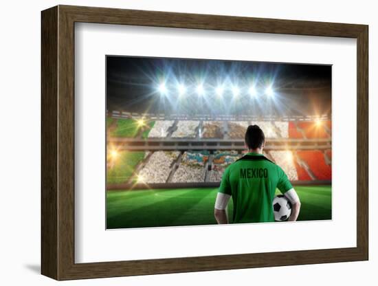 Mexico Football Player Holding Ball against Stadium Full of Mexico Football Fans-Wavebreak Media Ltd-Framed Photographic Print