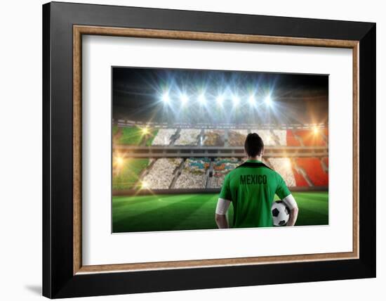 Mexico Football Player Holding Ball against Stadium Full of Mexico Football Fans-Wavebreak Media Ltd-Framed Photographic Print