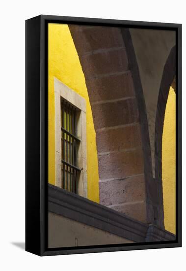 Mexico, Guanajuato Looking Up Through Arched Columns Against a Yellow Wall with Window-Judith Zimmerman-Framed Premier Image Canvas