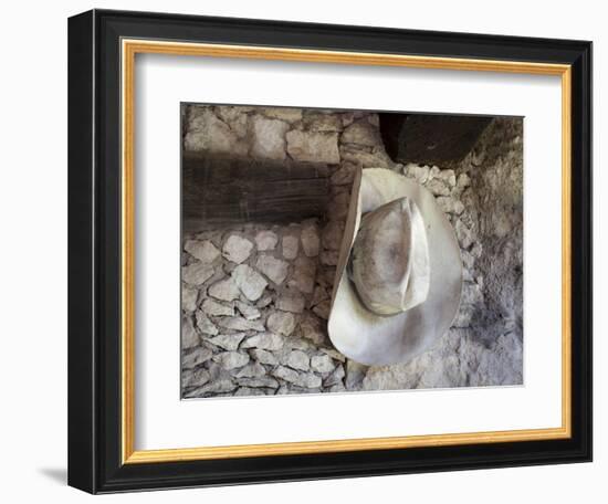 Mexico, Mineral de Pozos. Old cowboy hat hangs on wall.-Don Paulson-Framed Photographic Print