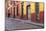 Mexico, San Miguel de Allende. Elderly man walks up sidewalk.-Don Paulson-Mounted Photographic Print