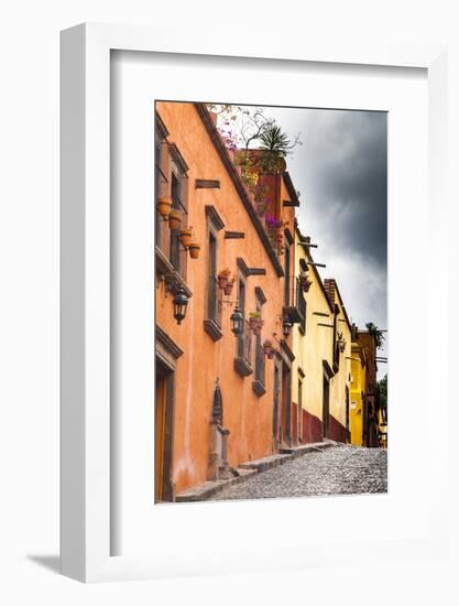 Mexico, San Miguel De Allende. Looking Up a Cobbled Street Along a Row of Colorful Home Facade-Judith Zimmerman-Framed Photographic Print