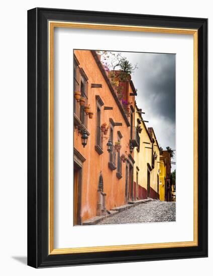 Mexico, San Miguel De Allende. Looking Up a Cobbled Street Along a Row of Colorful Home Facade-Judith Zimmerman-Framed Photographic Print