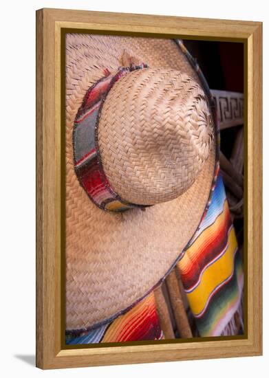 Mexico, Yucatan, Isla Mujeres, straw hat and colorful blankets.-Merrill Images-Framed Premier Image Canvas