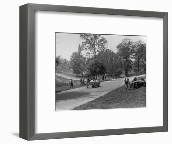 MG J2 passing the crashed Austin 7 of B Sparrow, Donington Park Race Meeting, Leicestershire, 1933-Bill Brunell-Framed Photographic Print
