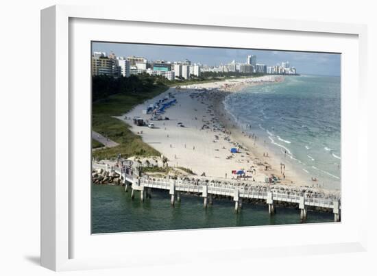 Miami Beach in Florida, with People Sunbathing on Golden Sands and the Waves from the Blue Sea-Natalie Tepper-Framed Photo