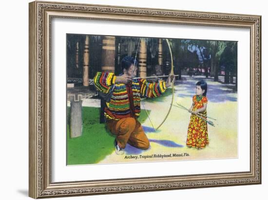 Miami, Florida - Tropical Hobbyland; Seminole Dad Showing Daughter Archery-Lantern Press-Framed Art Print