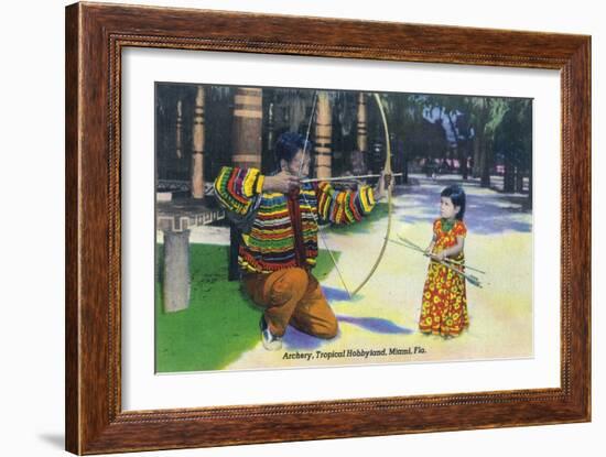 Miami, Florida - Tropical Hobbyland; Seminole Dad Showing Daughter Archery-Lantern Press-Framed Art Print