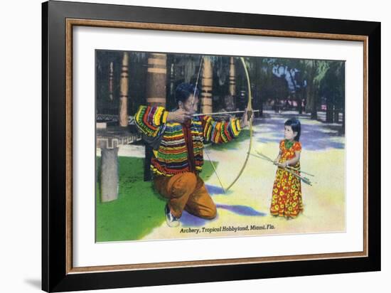 Miami, Florida - Tropical Hobbyland; Seminole Dad Showing Daughter Archery-Lantern Press-Framed Art Print