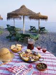 Paella with Olives, Bread and Sangria on a Table on the Beach in Andalucia, Spain-Michael Busselle-Photographic Print