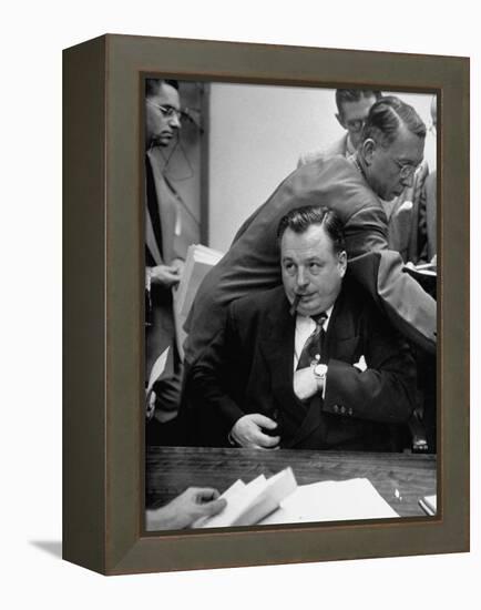 Michael V. Di Salle Puffing His Cigar while at His Desk-Hank Walker-Framed Premier Image Canvas