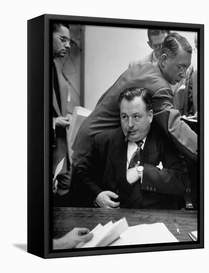 Michael V. Di Salle Puffing His Cigar while at His Desk-Hank Walker-Framed Premier Image Canvas