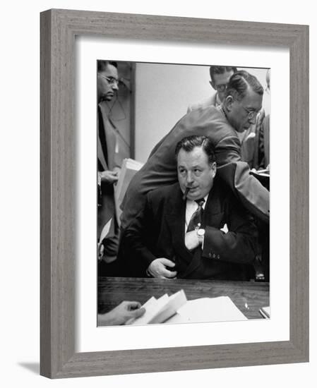 Michael V. Di Salle Puffing His Cigar while at His Desk-Hank Walker-Framed Photographic Print