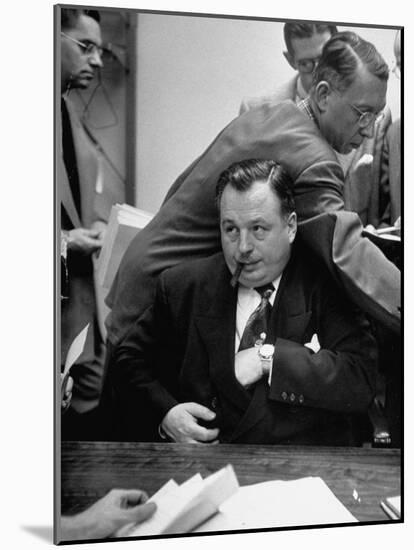 Michael V. Di Salle Puffing His Cigar while at His Desk-Hank Walker-Mounted Photographic Print