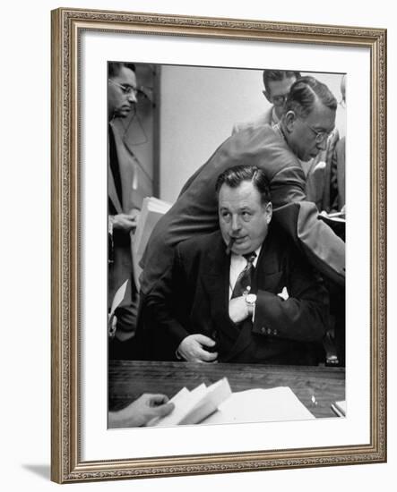 Michael V. Di Salle Puffing His Cigar while at His Desk-Hank Walker-Framed Photographic Print