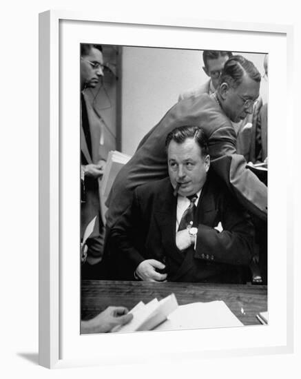 Michael V. Di Salle Puffing His Cigar while at His Desk-Hank Walker-Framed Photographic Print