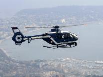A Gendarme Helicopter is Seen Above the Bay of Cannes-Michel Spingler-Framed Premier Image Canvas