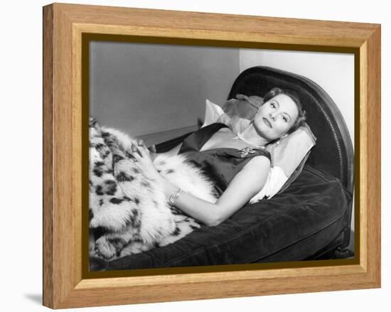 Michèle Morgan Laid on a Bed, 1951-Marcel Begoin-Framed Premier Image Canvas