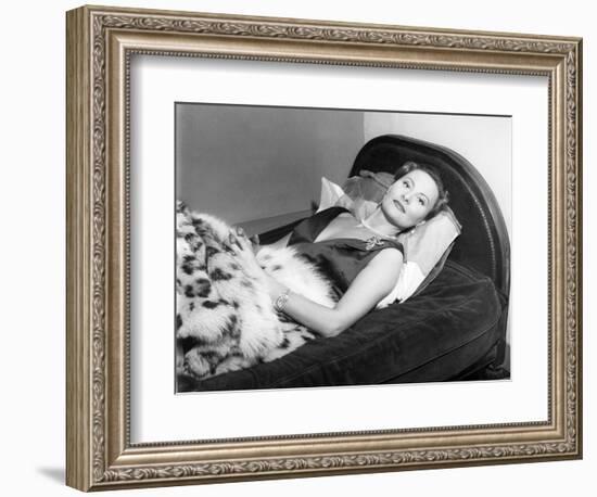 Michèle Morgan Laid on a Bed, 1951-Marcel Begoin-Framed Photographic Print