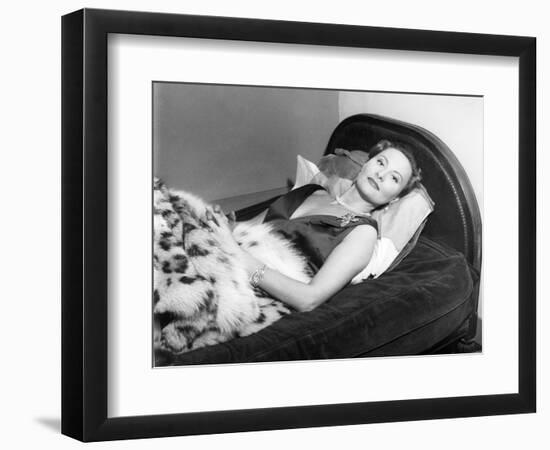 Michèle Morgan Laid on a Bed, 1951-Marcel Begoin-Framed Photographic Print