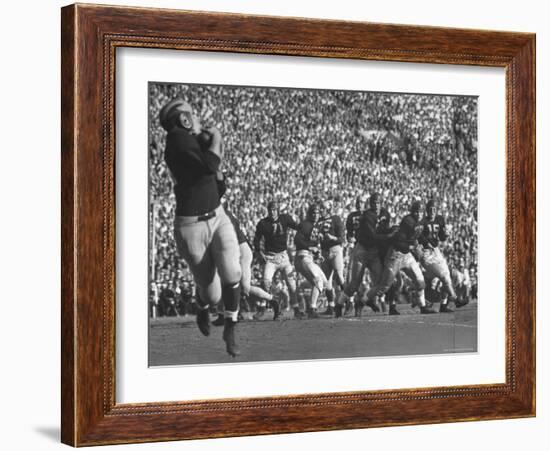 Michigan University's Bob Mann Catching a Pass From His QB Bob Chappuis-John Florea-Framed Premium Photographic Print