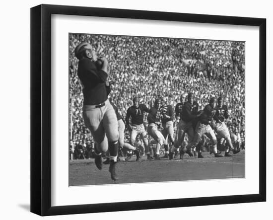 Michigan University's Bob Mann Catching a Pass From His QB Bob Chappuis-John Florea-Framed Premium Photographic Print