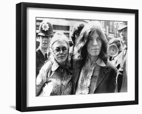 Mick Jagger and His Girl Friend, Singer Marianne Faithful Arrive at Magistrate's Court-null-Framed Premium Photographic Print