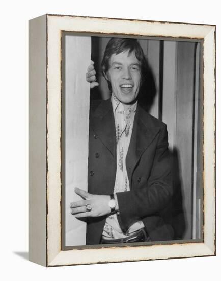 Mick Jagger in a Door-Associated Newspapers-Framed Stretched Canvas